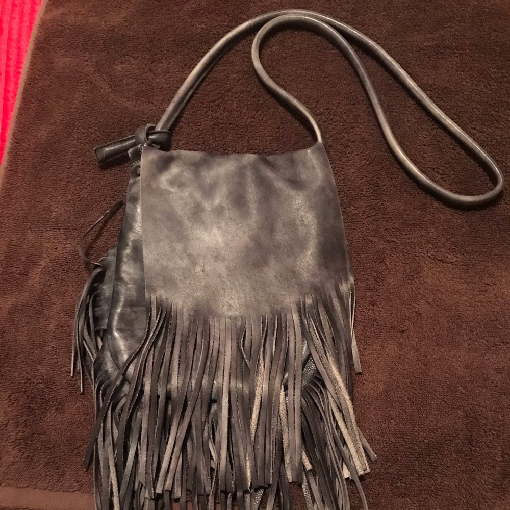 Adorable fringe leather purse.  Grey/blue color.